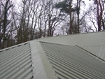 SEFAB: Olive green ridge caps and barge boards